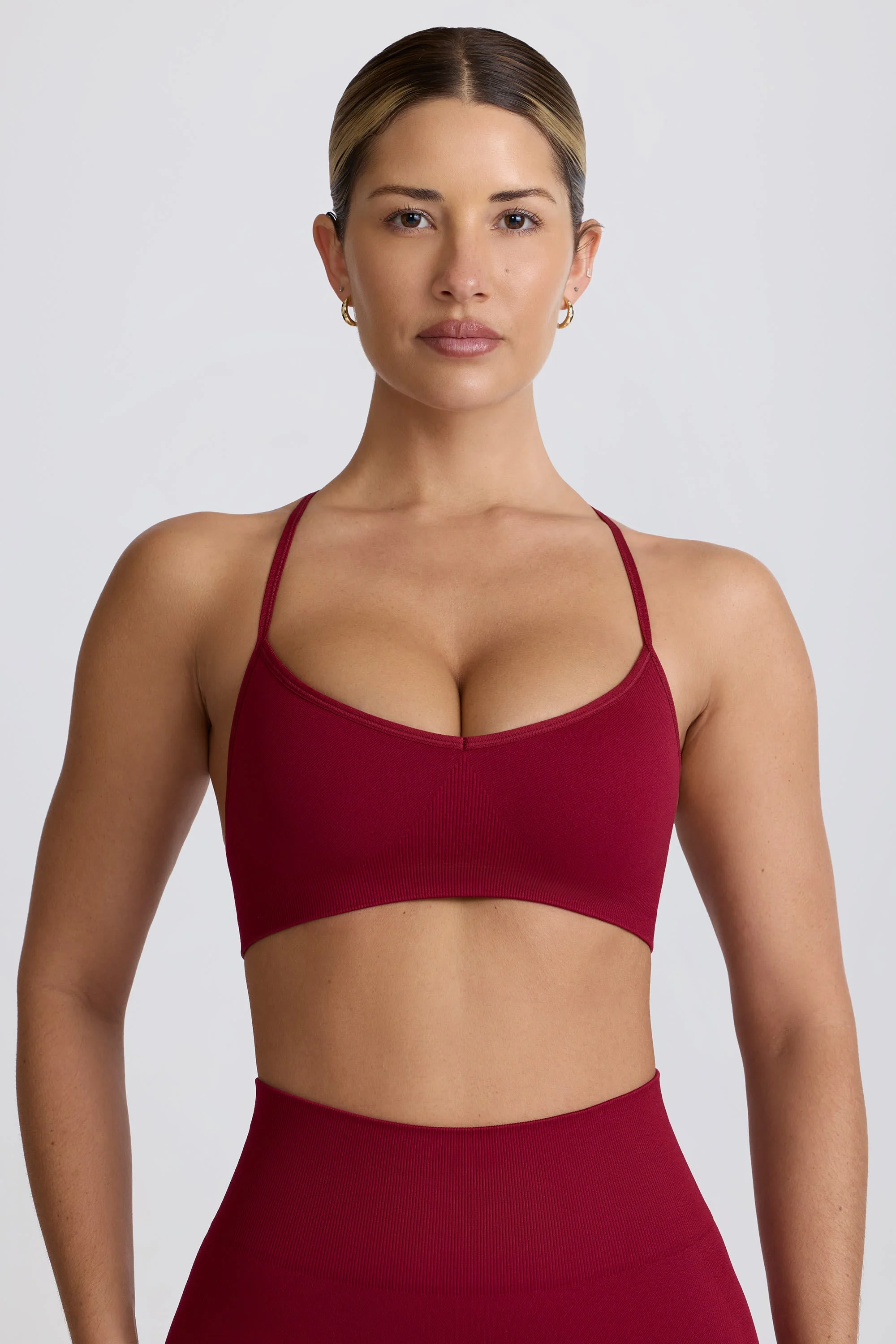 Professional Super Sculpt Seamless Cross-Back Sports Bra in Burgundy High-Performance