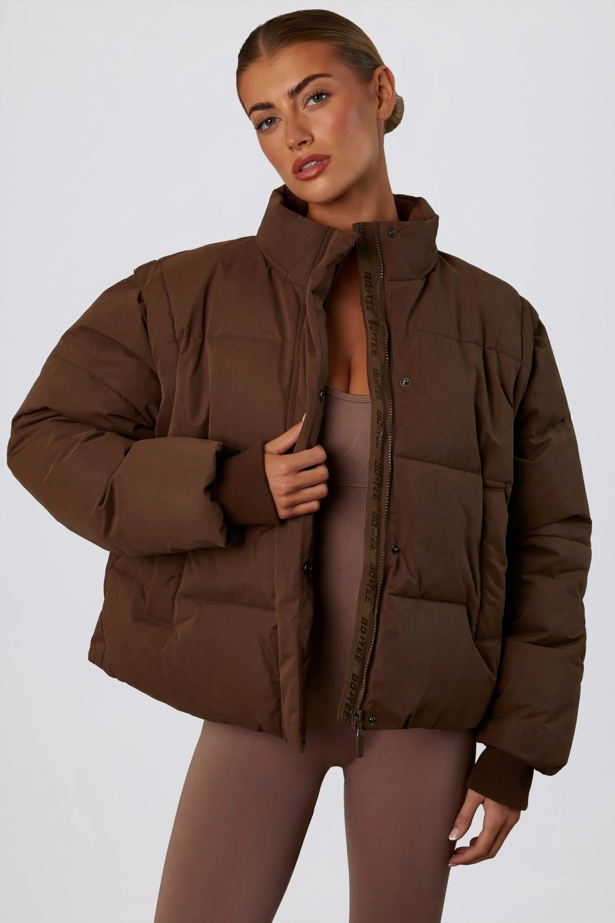 Eco-Friendly Cropped Puffer Jacket with Detachable Sleeves in Cocoa Brown Prestigious