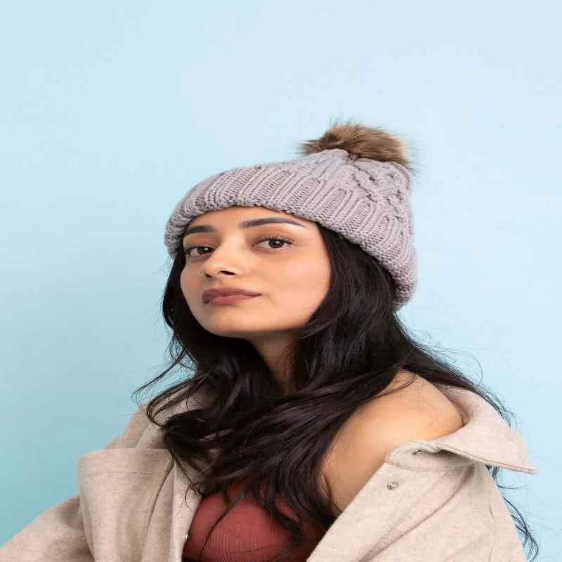 Recyclable Faux Pom Beanie for Stylish Warmth and Comfort Consistent