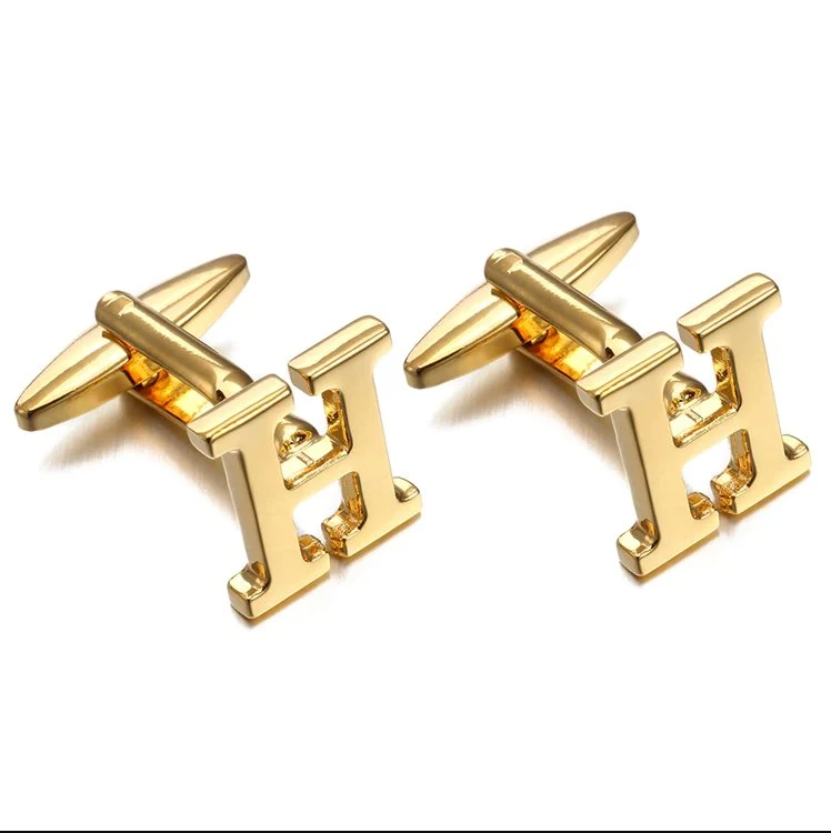 Elite Gemelos con monograma en tono dorado Consistent