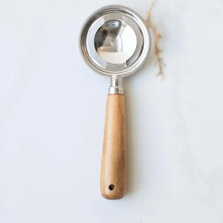 High-Grade Wood Handle Stainless Steel Egg Separator Relaxed